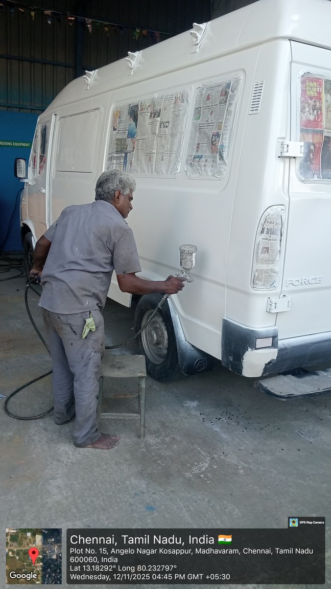 Vehicle panel being painted in the ACEIPL workshop